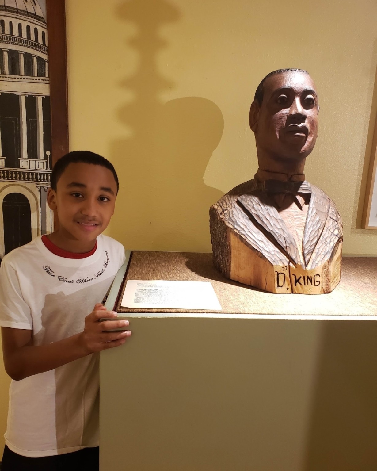 A B.O.C. youth visiting a civil-rights museum exhibit